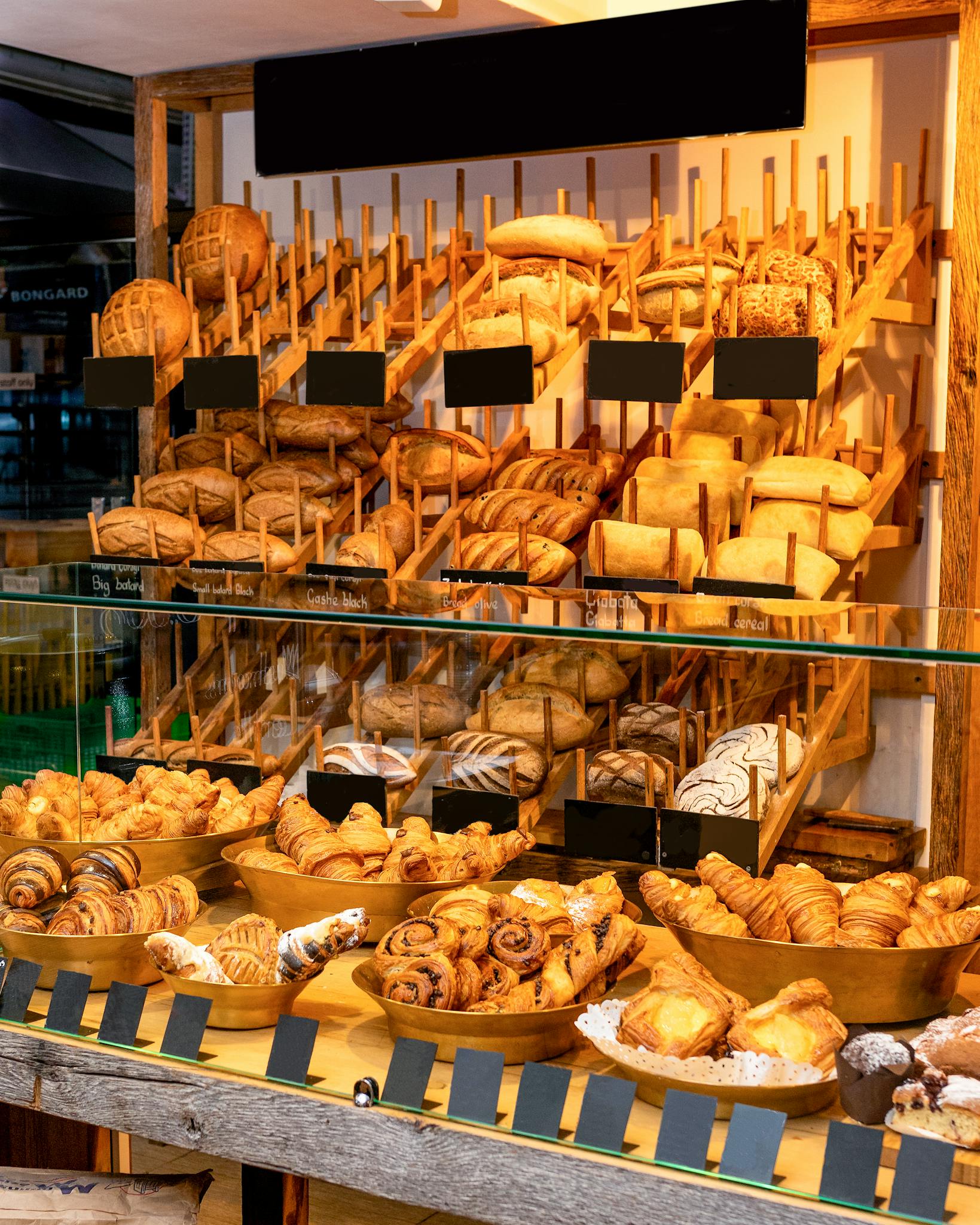 Bread on Clear Glass Display Counter